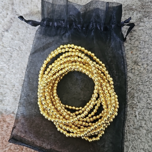 Elegant Gold Beaded Bracelet Set Of 12. - Picture 2 of 2